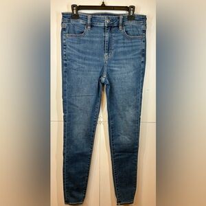 American Eagle High Rise Jegging Size 10 Long Next Level Stretch Skinny Med Wash